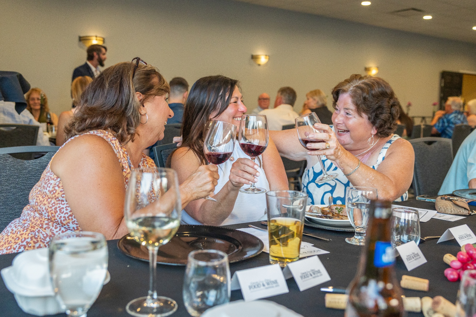 Guests enjoying cocktails and wine on the Barrique patio